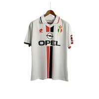 تيشيرت ميلان كلاسيك 95/97 ب اسم ورقم باجيو