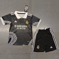 طقم ريال مدريد التنين الاسود اطفال