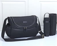 شنطة قوتشي أسود