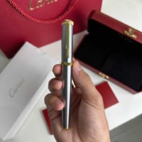 قلم كارتييه تيتانيوم ذهبي