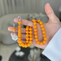 برتقالي صك