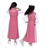 مريول إبتدائي وردي بتصميم كويتي من ذو الجناحين