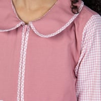 مريول إبتدائي زهري بتصميم كويتي من ذو الجناحين