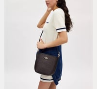 حقيبة بكت من كوتش باللون البني