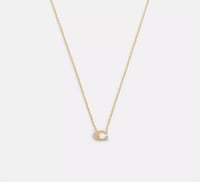 عقد باللون الذهبي من كوتش