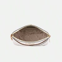 كروس بدي من مايكل كورس باللون الكريمي و البني