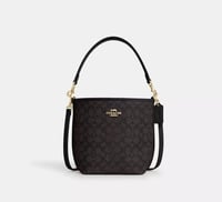 حقيبة بكت من كوتش باللون البني