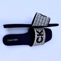 حذاء فلات بالون البني من كالفن كلاين