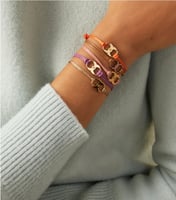 اسوارة باللون الاسود من توري برتش