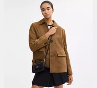 كروس بدي من كوتش باللون الاسود