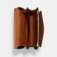 كروس بدي من كوتش باللون الاسوذ