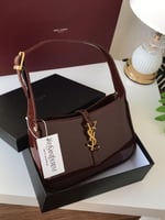 شنطة سان لوران عودي لامع