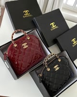 شنطة شانيل عنابي لامع صغير