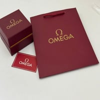 ساعة اوميغا نسائية فضي