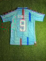 تيشيرت برشلونة الكلاسيكي 1996 - رونالدو 9 إصدار Ka...