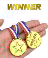 ميداليات ذهبية لتشجيع الأطفال