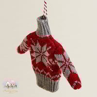 1366 اكسسوار وتعليقة شتوية بشكل بلوزة