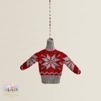 1366 اكسسوار وتعليقة شتوية بشكل بلوزة