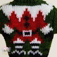 6213 اكسسوار وتعليقة شتوية بشكل بلوزة