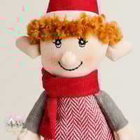 1234 دمية وتعليقة الولد الشتوية