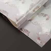 ورق تغليف هدايا جلتر