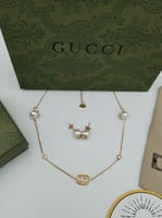 طقم سلسال وحلق قوتشي