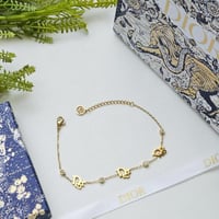 اسوارة ديور ذهبي مع الملحقات