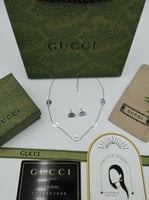 طقم سلسال وحلق قوتشي