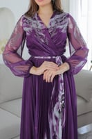 فستان دبل كلوش تصميم كسرات مزين بالفصوص