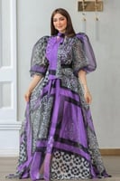 فستان أنيق يجمع بين الفخامة والعصرية مزين بنقوش هن...