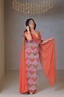 فستان أورنج مطرز بتصميم فاخر وانسيابية أنيقة