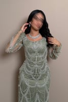 فستان زيتي فاتح بتفاصيل فاخرة من مليحة