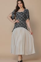 فستان أنيق يجمع بين الطابع الكلاسيكي واللمسة العصر...