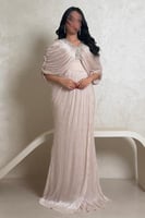 فستان بيج لامع بتصميم مميز على الكتف وتطريز فاخر