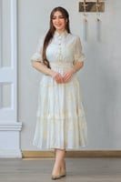 فستان كشكش أوف وايت بتطريز ذهبي ولمسة ملكية