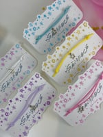 توزيعات عيد أساور خيوط