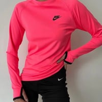 تيشيرت نايك باللون الفسفوري الوردي