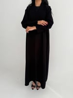 الدرة | بقماش الكريب الاندونيسي الأسود كلوش وبقصة...