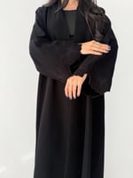 النادرة | بقماش كريب اندونيسي اسود بتخريم وتطريز د...