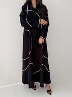 الفارقة | بقماش كريب اندونيسي اسود مع تطريز حلزوني...