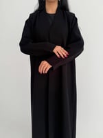 الدرة | بقماش الكريب الاندونيسي الأسود كلوش وبقصة...