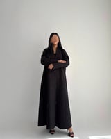 العالية | بقماش الجوخ الأسود مع فصوص لولو قصة كلوش