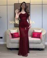 فستان الجمال (فستان برغندي كلفه شك مطرزه)