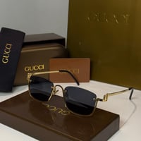 نظارة قوتشي باللون الذهبي بعدسة مستطيلة نص إطار