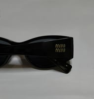 نظارة ميو ميو باللون الاسود