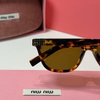 نظارة ميو ميو كلاسيك باللون التايقر وعدسة بنية