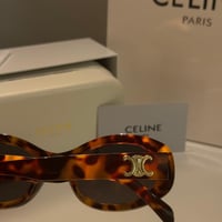 نظارة سيليN باللون التايقر بإطار بيضاوي