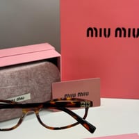 نظارة ميو ميو Line باللون التايقر وعدسة شفافة