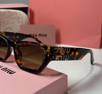 نظارة ميو ميو تايقر