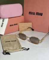 نظارة mيو ميو باللون الذهبي